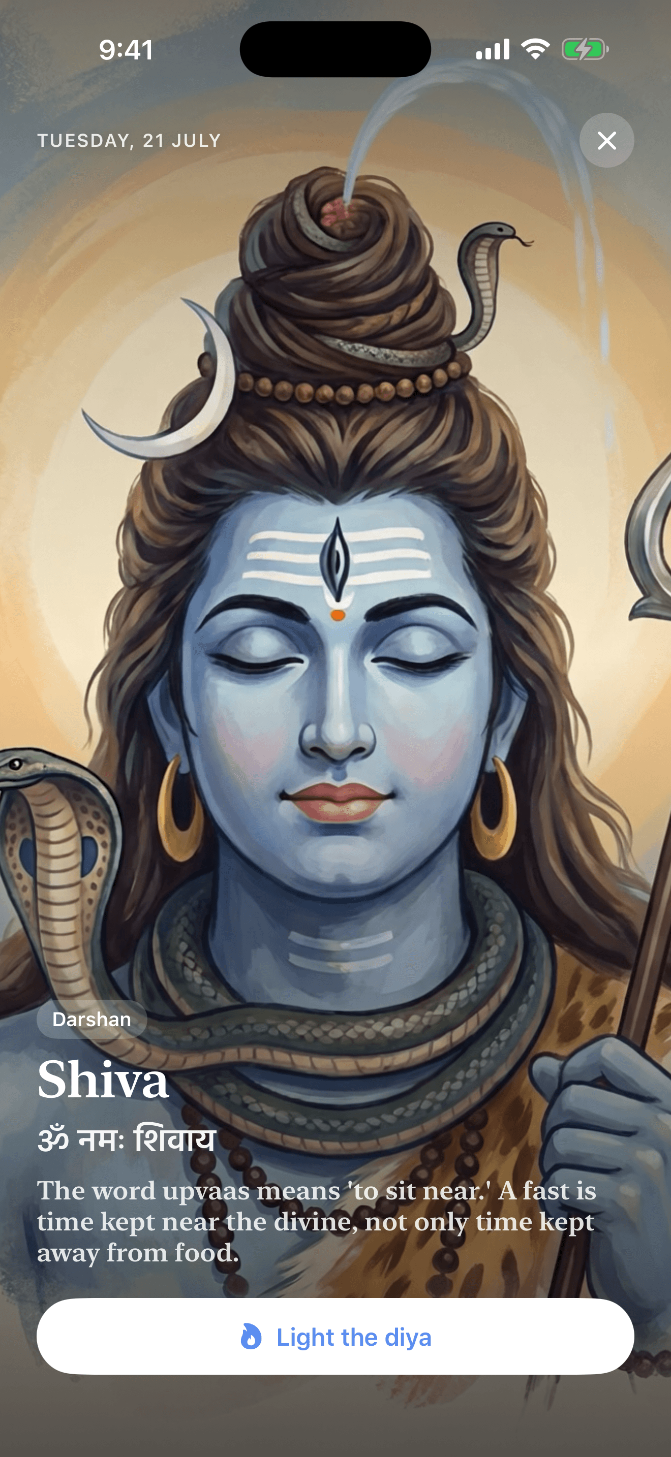 A full-screen darshan of Shiva, with the day's mantra