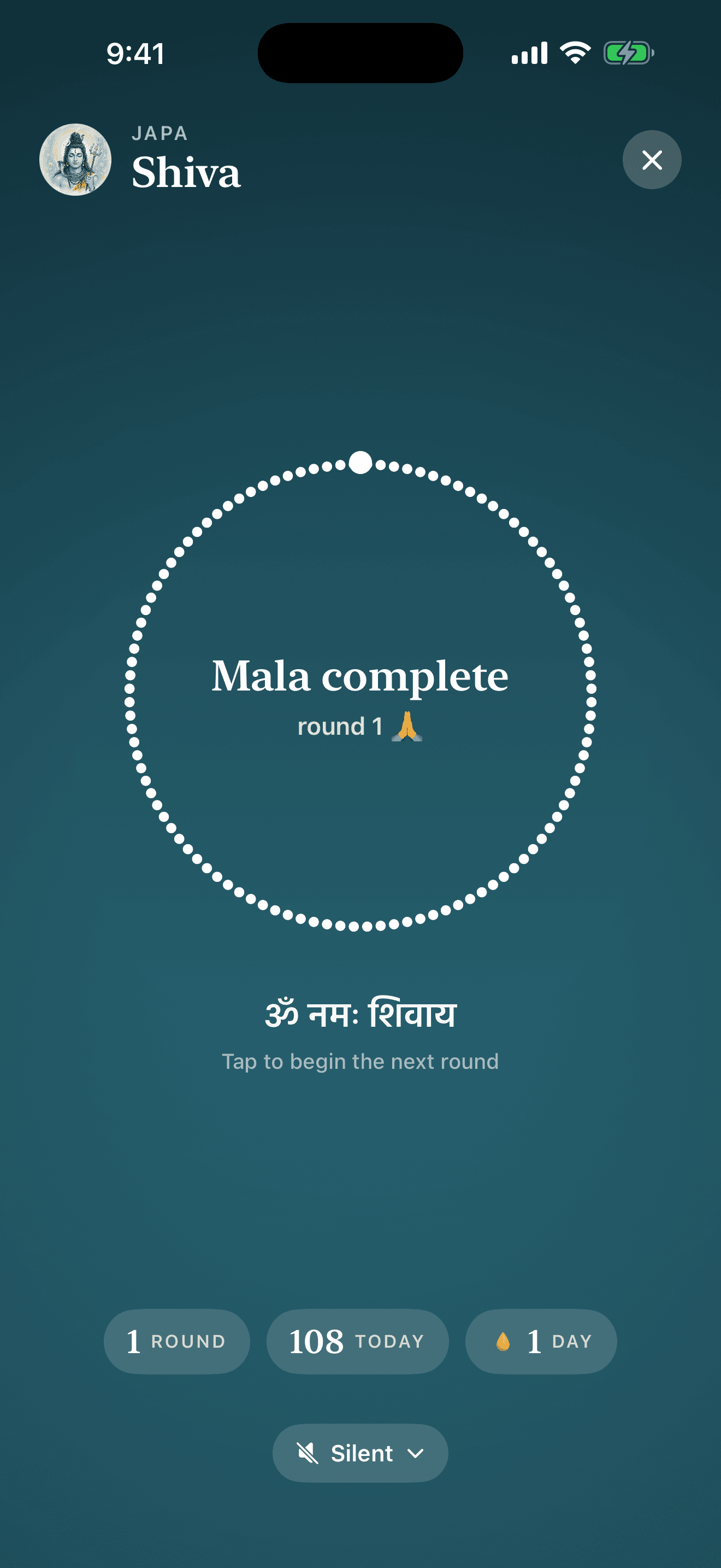 The mala complete — the ritual done, apps opening